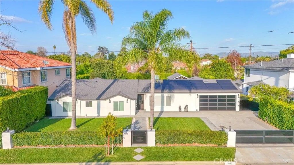 Photo of 9145 Raviller Drive, Downey, CA 90240 (MLS # DW26017733)