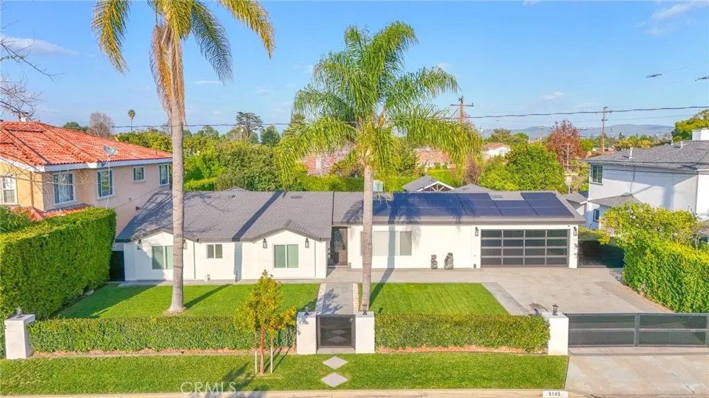 Photo of 9145 Raviller Drive, Downey, CA 90240 (MLS # DW26017733)