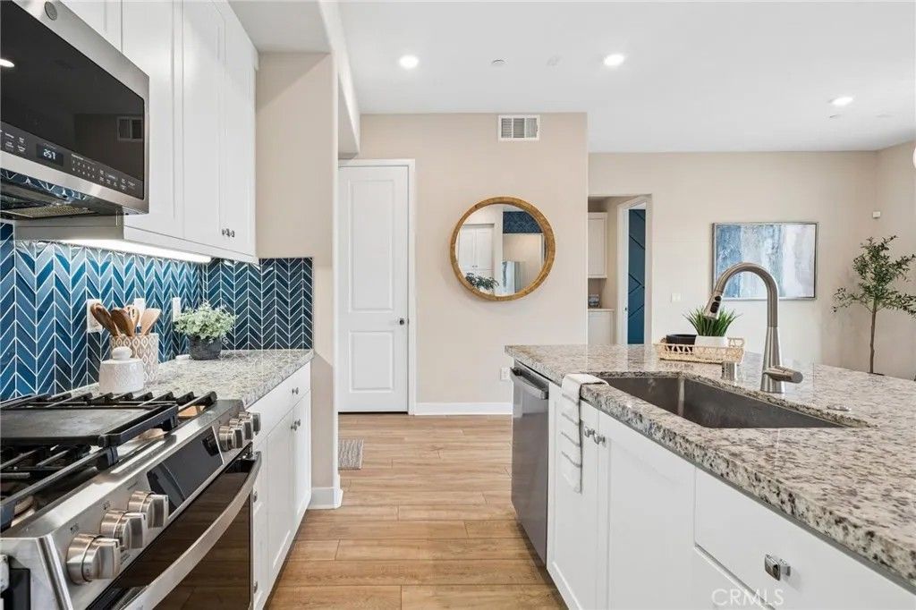 Photo of 27466 Mercantile Court #205, Valencia, CA 91381 (MLS # SR26071797)