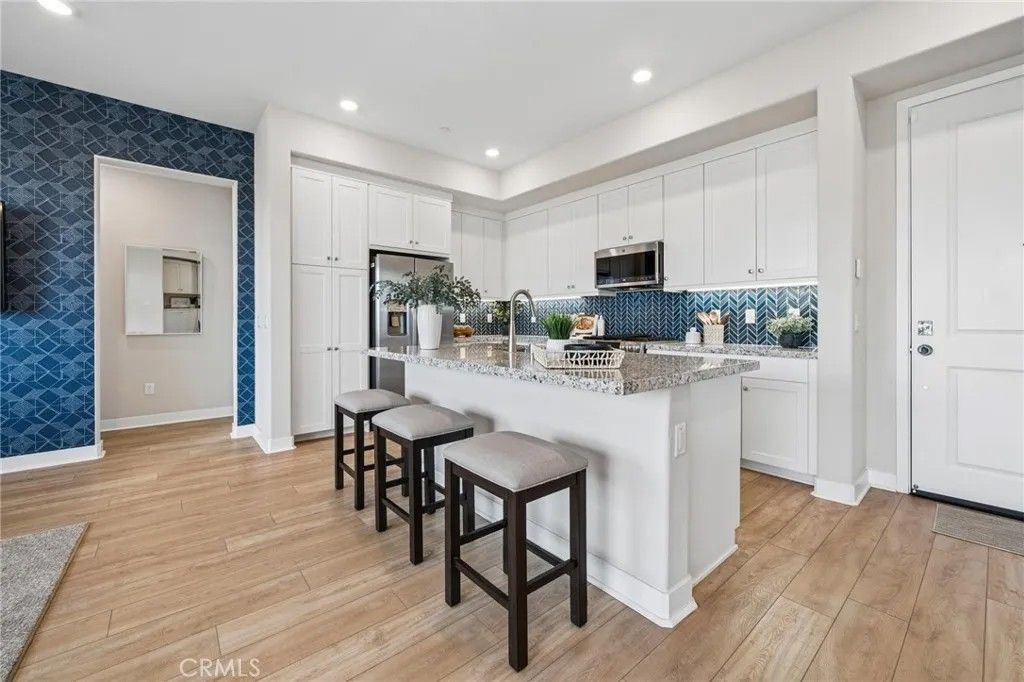 Photo of 27466 Mercantile Court #205, Valencia, CA 91381 (MLS # SR26071797)