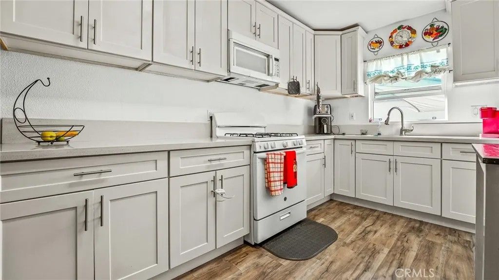 Photo of 6546 Foster Bridge Blvd, Bell Gardens, CA 90201 (MLS # DW25269135)