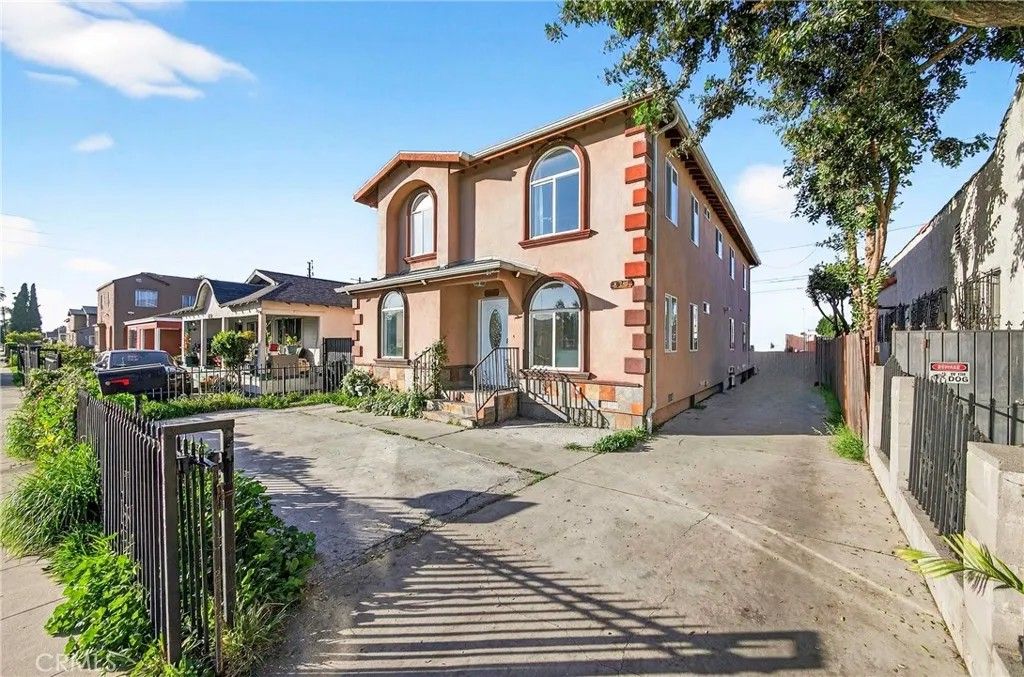 Photo of 819 E 73rd St, Los Angeles, CA 90001 (MLS # TR26028730)