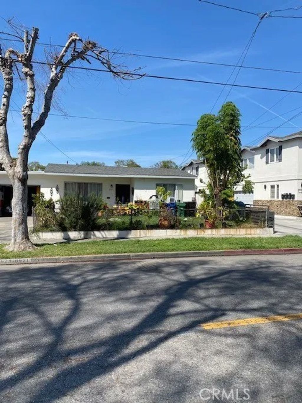 Photo of 6921 Vinevale Ave, Bell, CA 90201 (MLS # DW26080781)