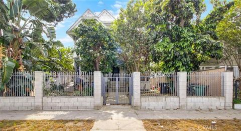 Photo of 614 E 23rd St, Los Angeles, CA 90011 (MLS # DW26071501)