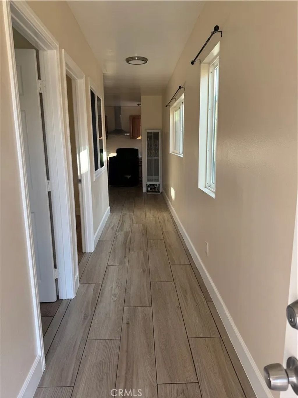 Photo of 1309 W 62nd St, Los Angeles, CA 90044 (MLS # SR26060845)