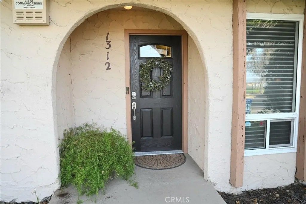 Photo of 1312 Riverview Drive, Madera, CA 93637 (MLS # MD26016239)