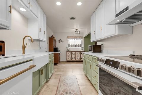 Photo of 1213 E A St, Oakdale, CA 95361 (MLS # MC26086460)