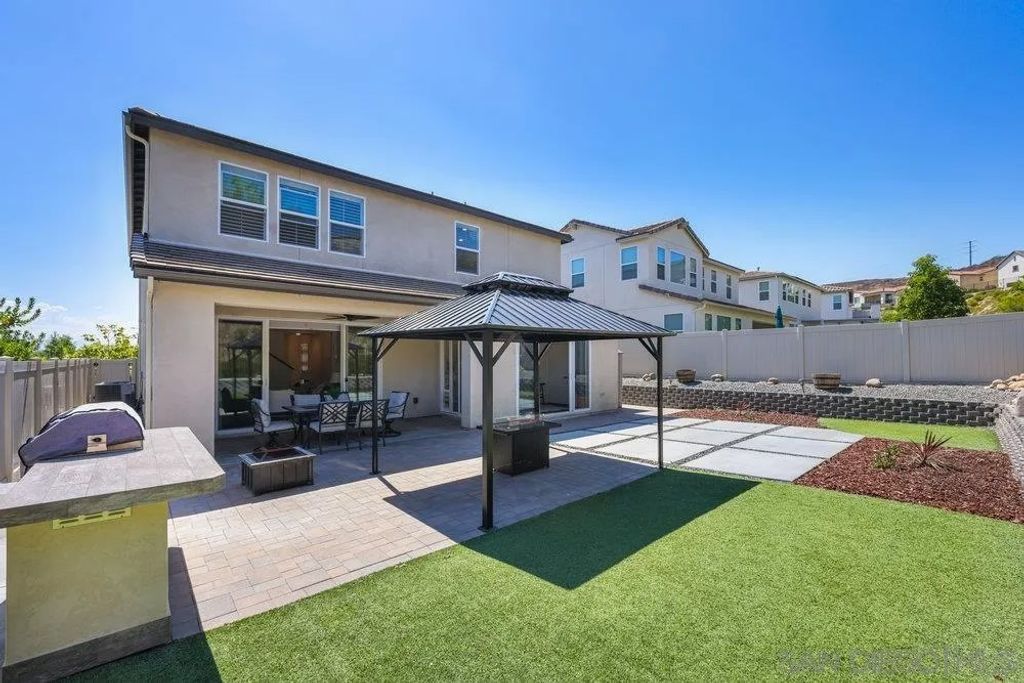 Photo of 8894 Trailridge Ave, Santee, CA 92071 (MLS # 250038195)