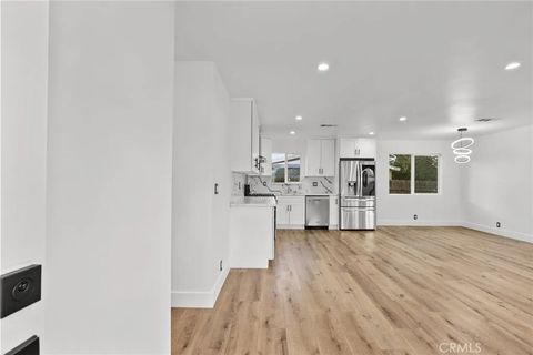 Photo of 12869 Norris Avenue, Sylmar, CA 91342 (MLS # SR26008970)