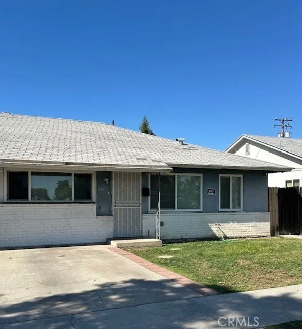 Photo of 2305 E Shields Ave, Fresno, CA 93726 (MLS # FR26095592)