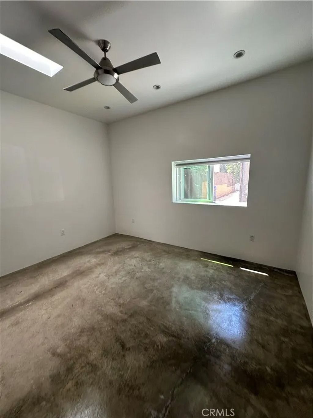 Photo of 1046 S Hudson Avenue, Los Angeles, CA 90019 (MLS # DW26050959)