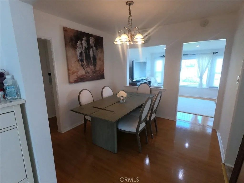 Photo of 9812 S Denker Ave, Los Angeles, CA 90047 (MLS # MB26044758)