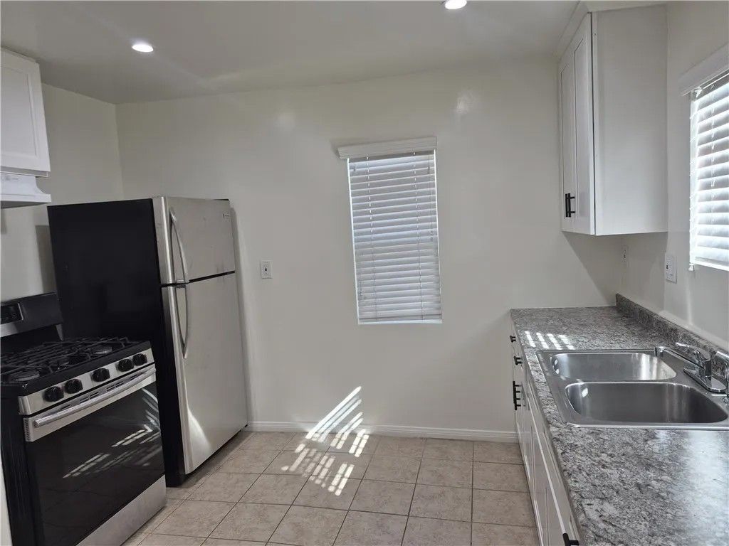 Photo of 716 W 75th Street, Los Angeles, CA 90044 (MLS # IN26035583)