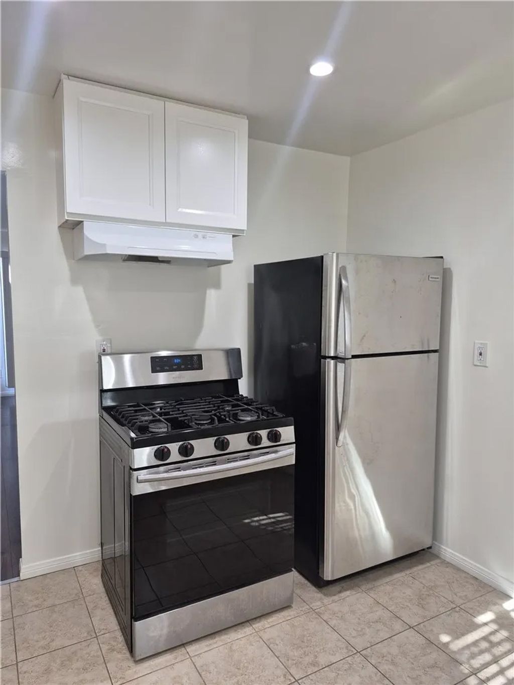 Photo of 716 W 75th Street, Los Angeles, CA 90044 (MLS # IN26035583)