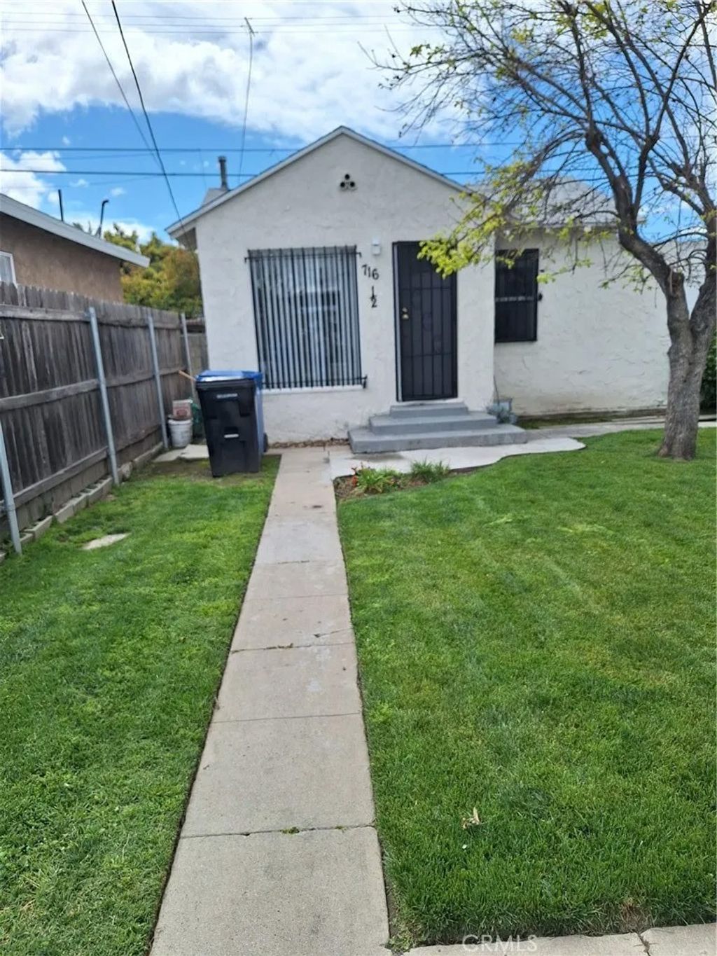 Photo of 716 W 75th Street, Los Angeles, CA 90044 (MLS # IN26035583)