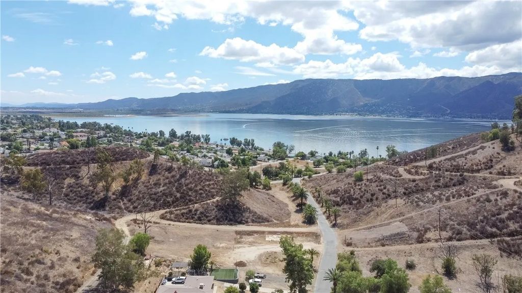 Photo of 1 Palm Dr, Lake Elsinore, CA 92530 (MLS # SR26010153)