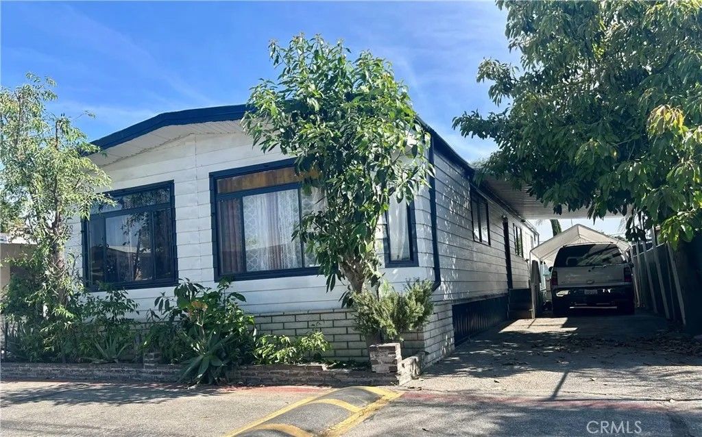Photo of 1401 W 9th St #148, Pomona, CA 91766 (MLS # CV26086508)