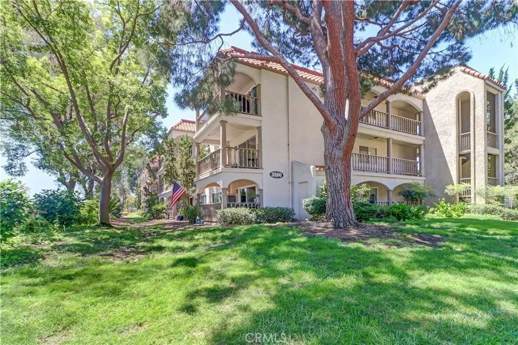Photo of 3500 Bahia Blanca W #3B, Laguna Woods, CA 92637 (MLS # OC26164045)