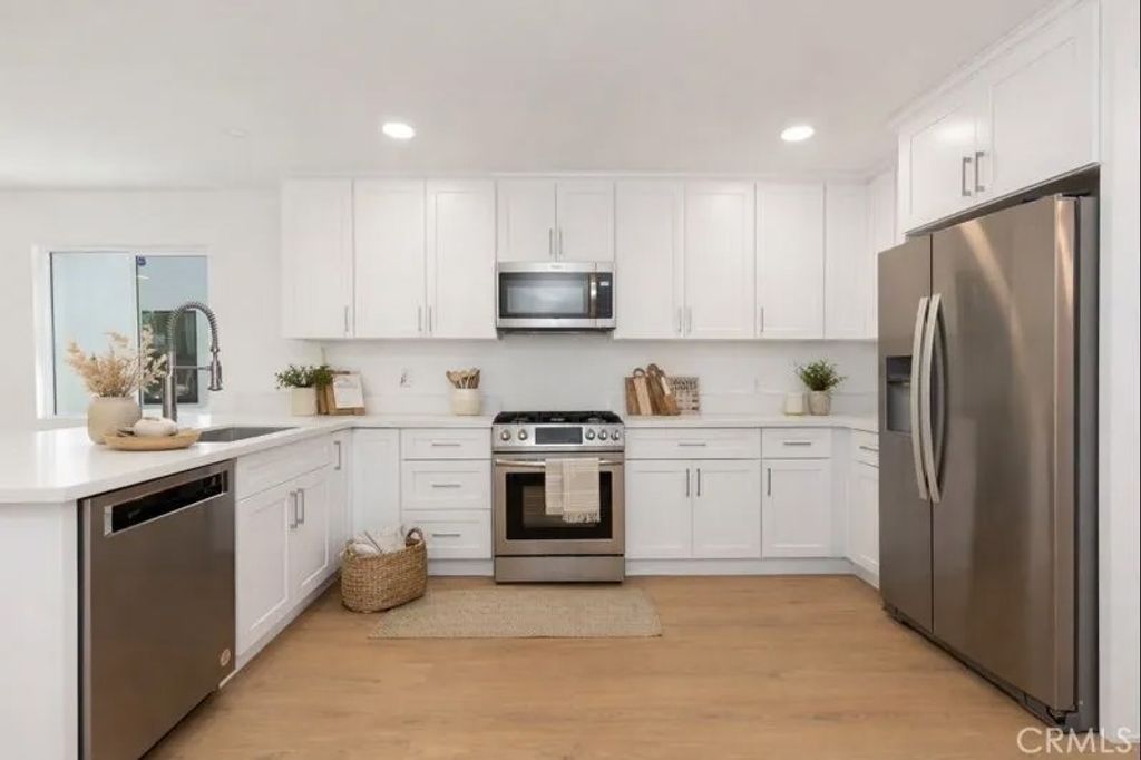 Photo of 1845 W 66th St, Los Angeles, CA 90047 (MLS # DW26054614)