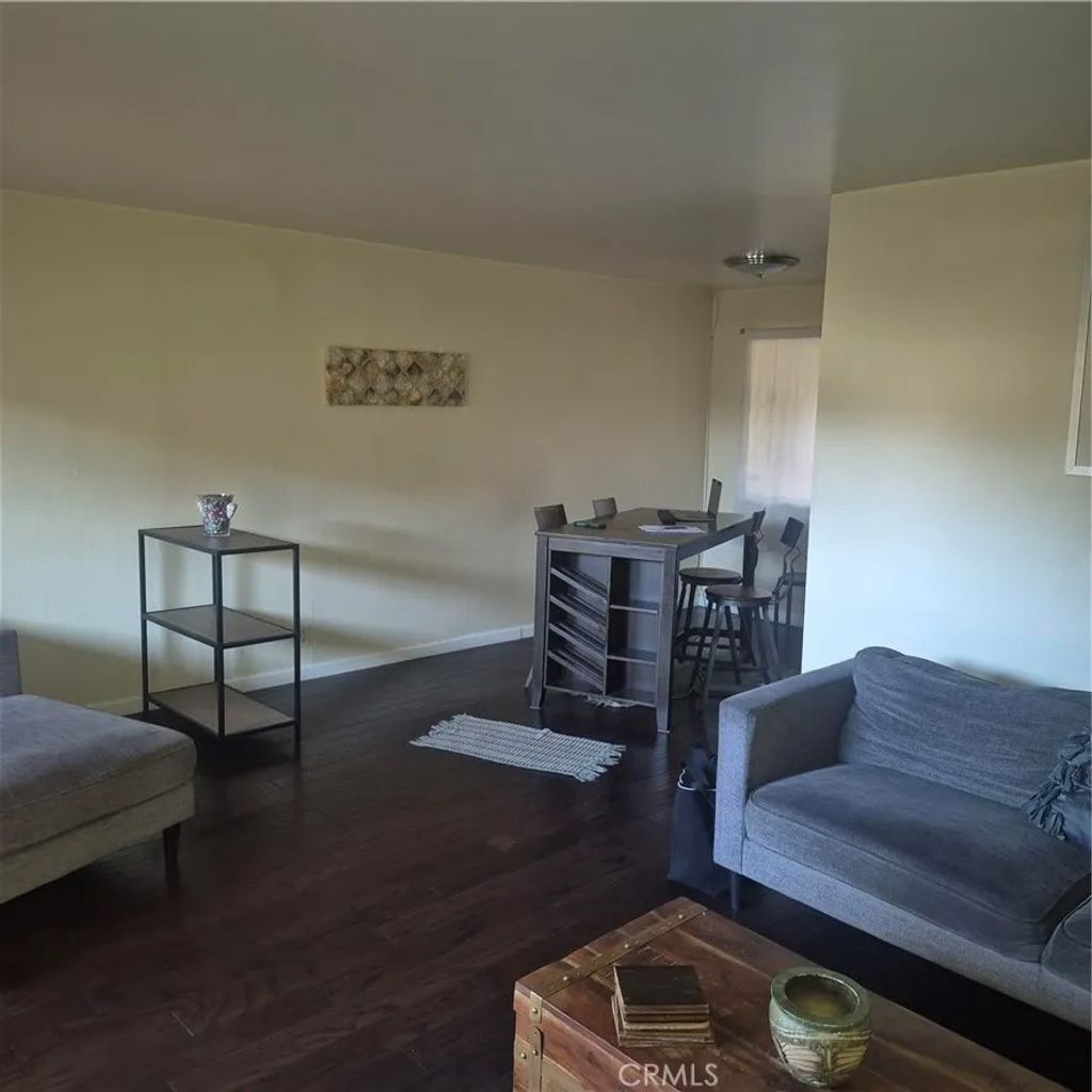 Photo of 1203 E San Antonio Dr #102, Long Beach, CA 90807 (MLS # OC26013357)