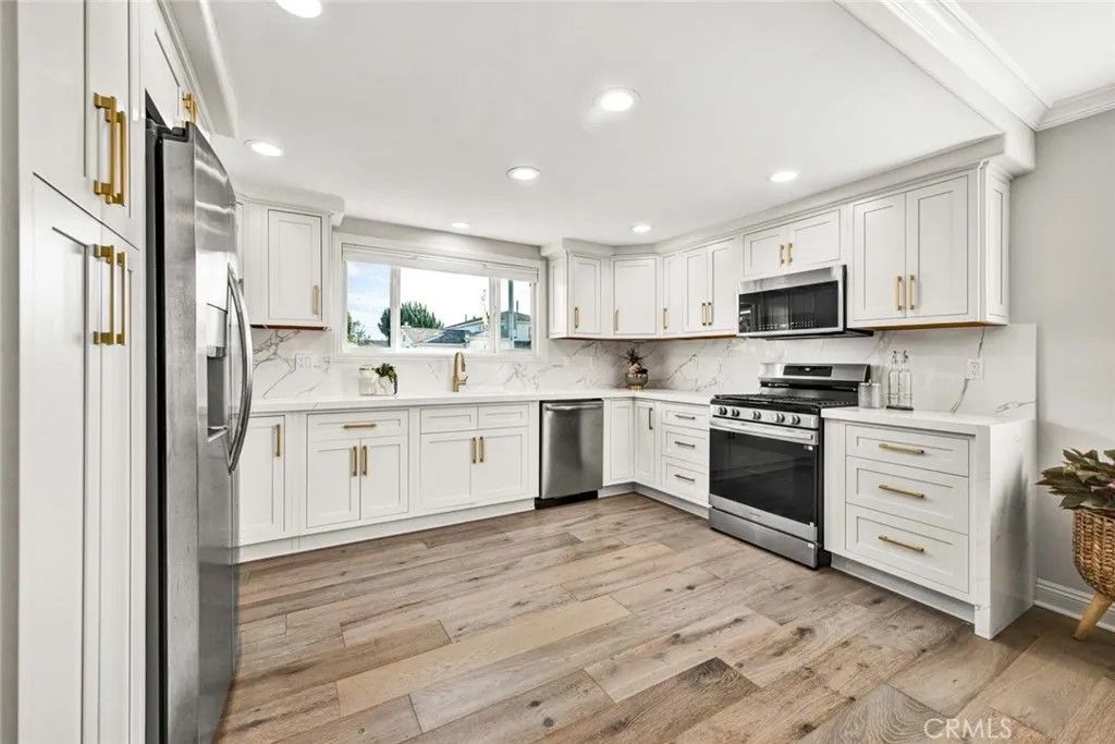 Photo of 9301 Portsmouth Drive, Huntington Beach, CA 92646 (MLS # OC26050990)