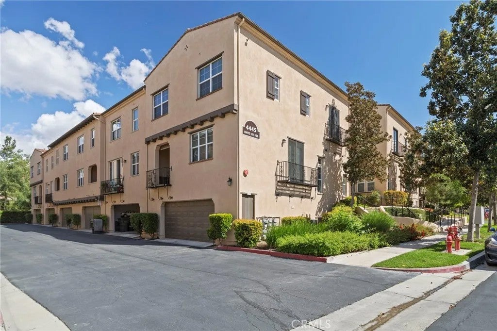 Photo of 4445 Owens Street #101, Corona, CA 92883 (MLS # TR26079757)