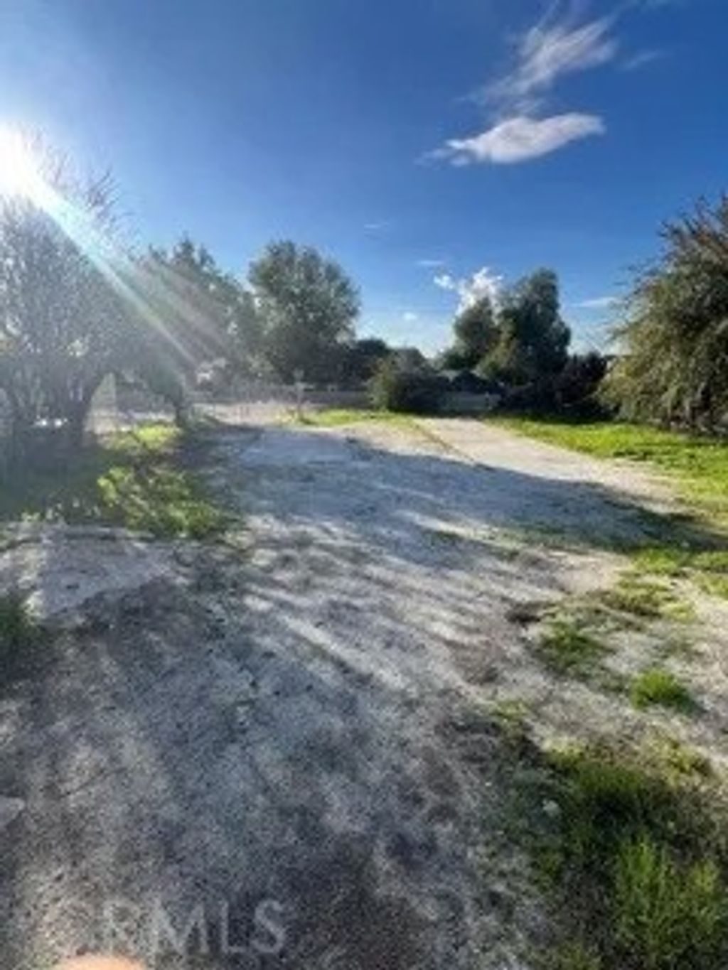 Photo of 205 Navajo Road, Perris, CA 92570 (MLS # SR26014325)