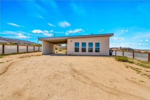 Photo of 7276 Encina Road, Joshua Tree, CA 92252 (MLS # JT26047360)