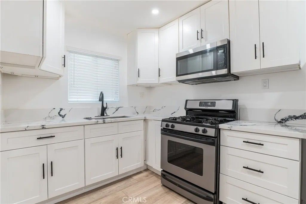 Photo of 7348 Florence Ave #4, Downey, CA 90240 (MLS # DW25278338)