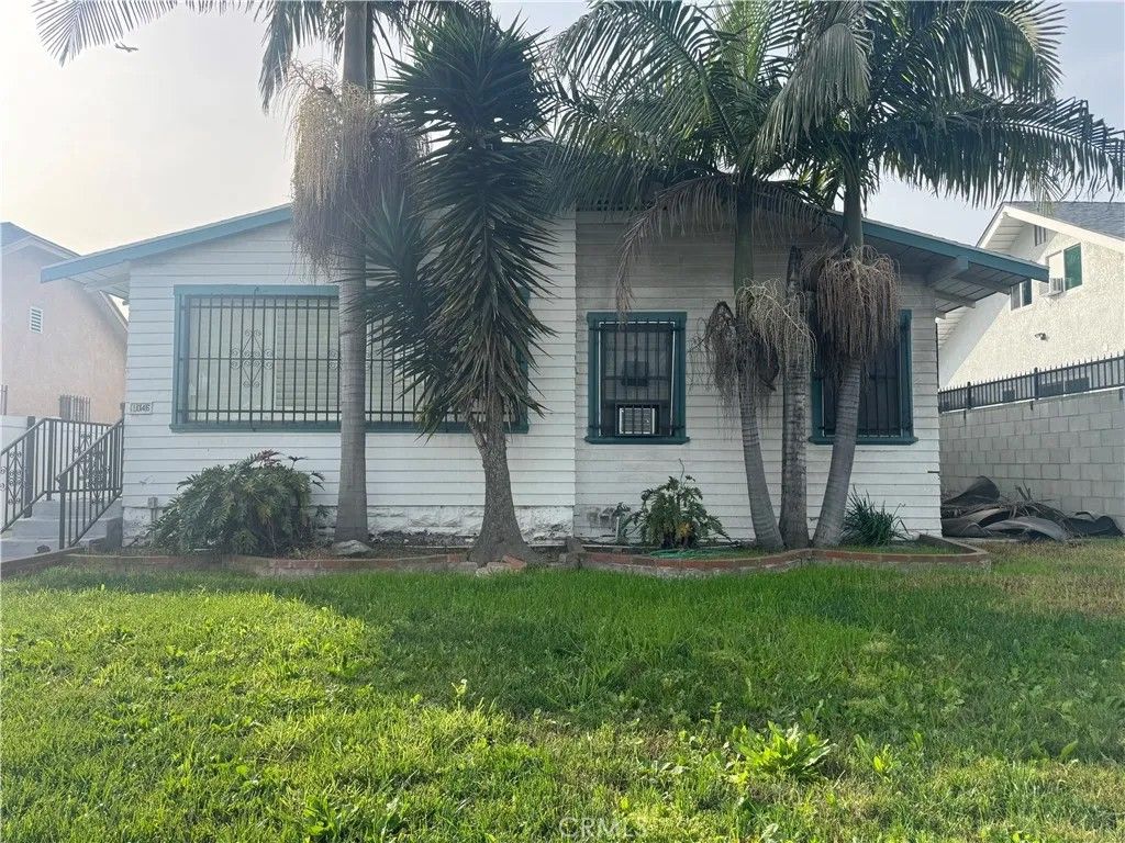 Photo of 1046 W 73rd St, Los Angeles, CA 90044 (MLS # IV26019348)