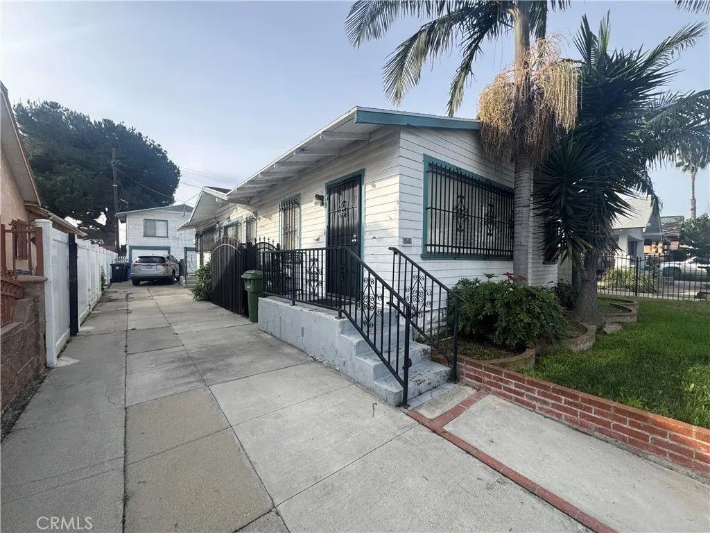 Photo of 1046 W 73rd St, Los Angeles, CA 90044 (MLS # IV26019348)