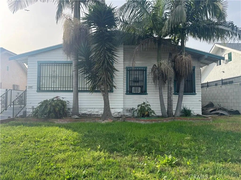 Photo of 1046 W 73rd St, Los Angeles, CA 90044 (MLS # IV26019348)