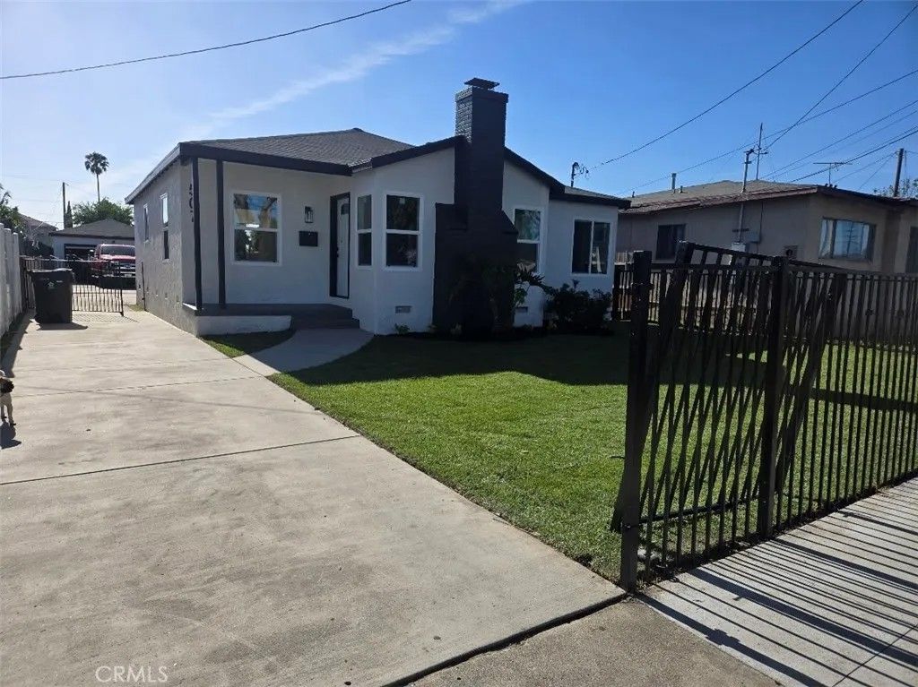 Photo of 507 N Santa Fe Ave, Compton, CA 90221 (MLS # DW26090157)