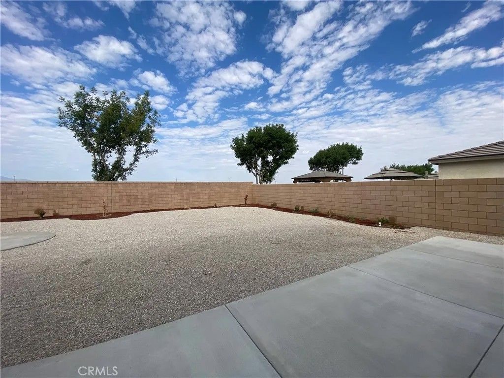 Photo of 13014 Woodhill Street, Victorville, CA 92392 (MLS # HD25274206)
