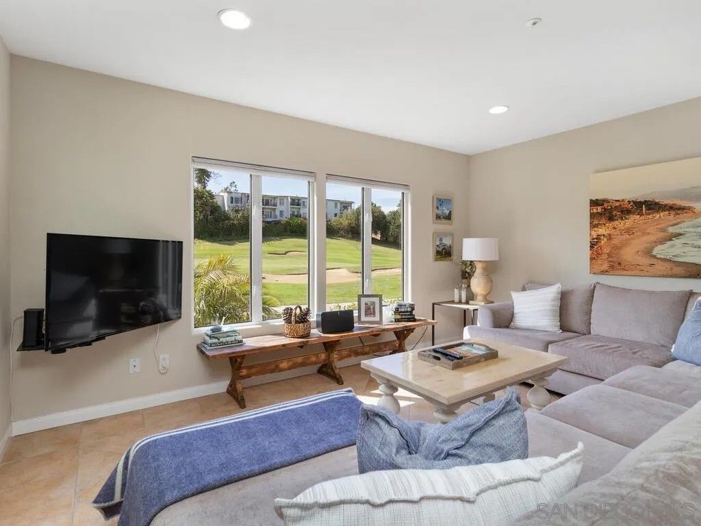 Photo of 7517 Jerez Ct #B, Carlsbad, CA 92009 (MLS # 250038294)