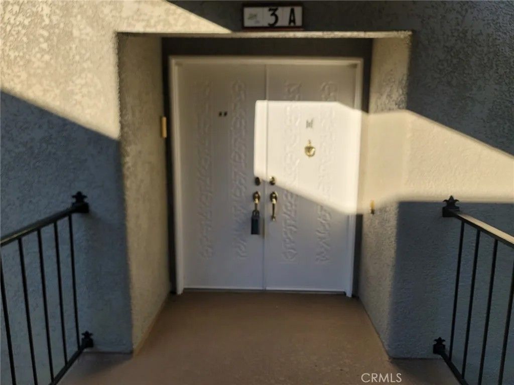 Photo of 2403 Via Mariposa #3A, Laguna Woods, CA 92637 (MLS # OC25267442)