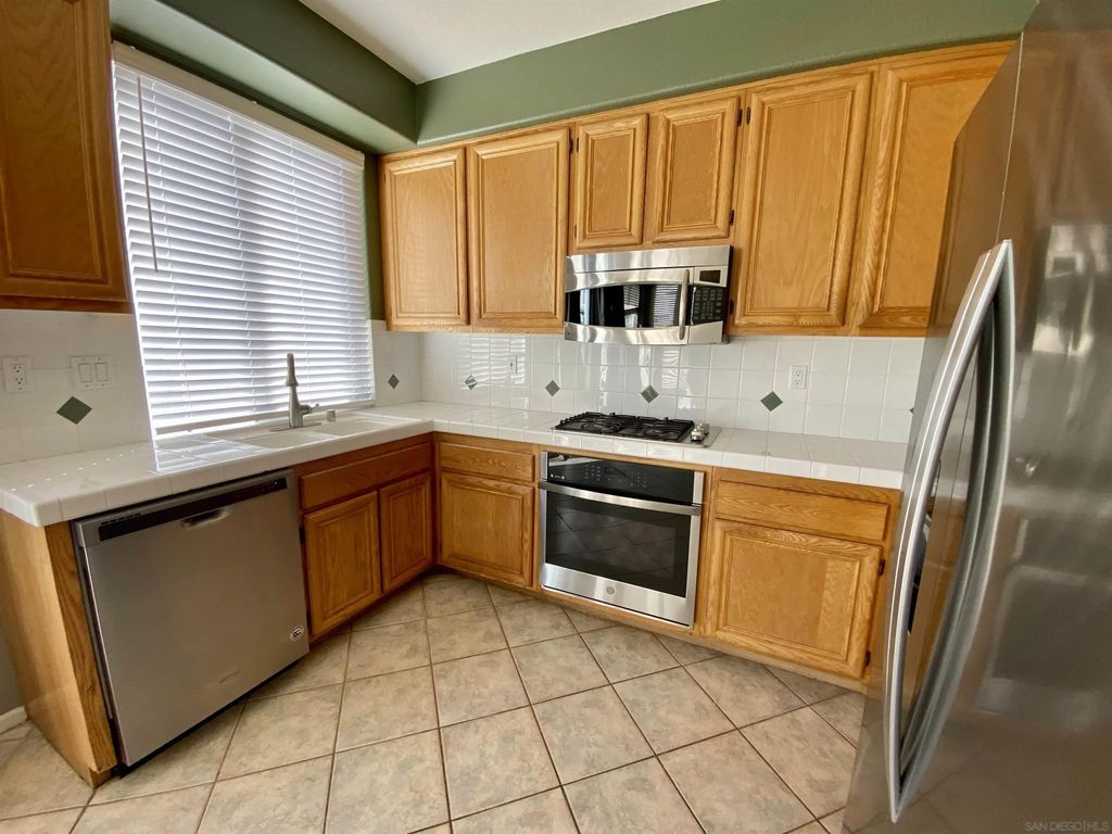 Photo of 18771 Caminito Pasadero #67, San Diego, CA 92128 (MLS # 260004012)