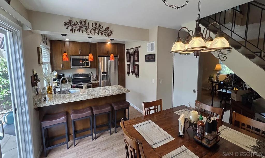 Photo of 7839 Rancho Fanita Dr #E, Santee, CA 92071 (MLS # 260020070)