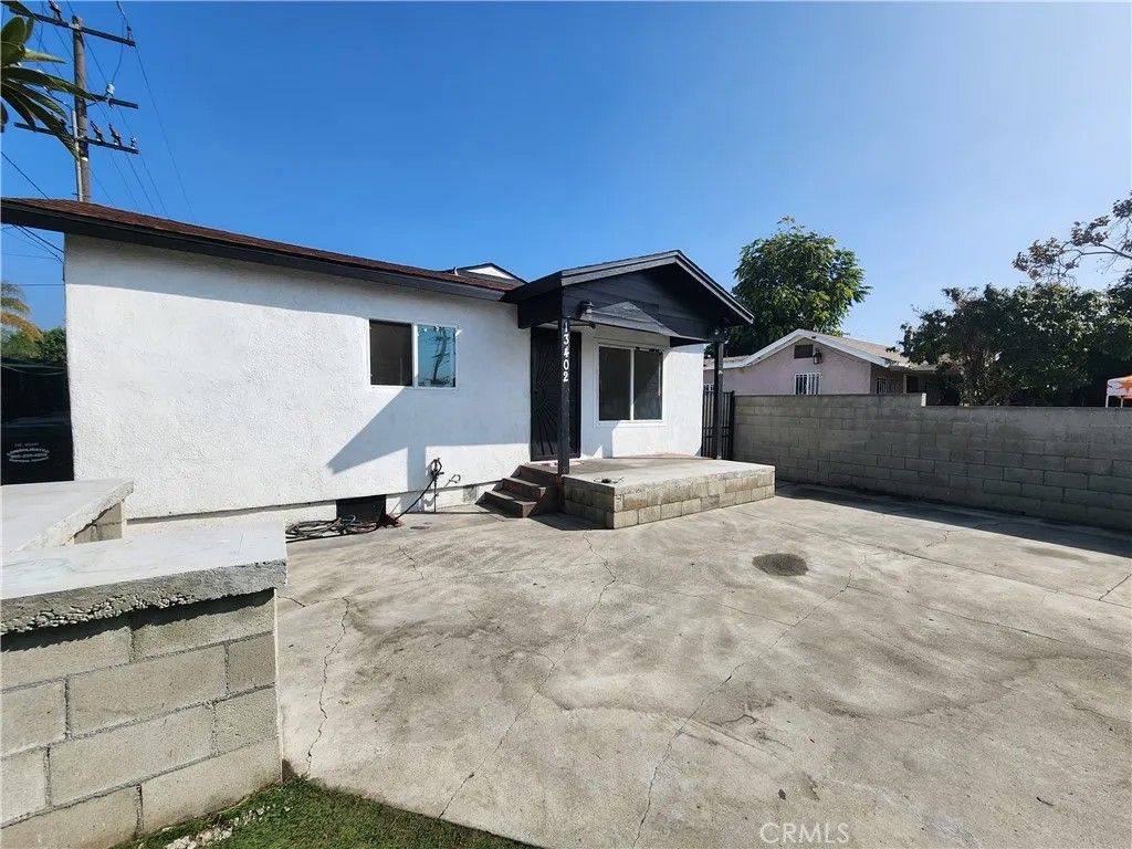 Photo of 13402 S Willowbrook Ave, Compton, CA 90222 (MLS # IG25276761)