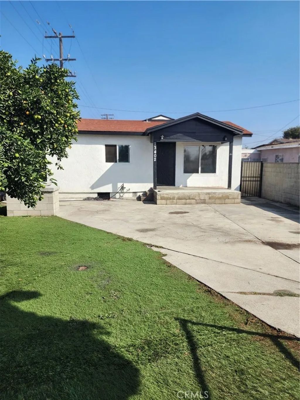 Photo of 13402 S Willowbrook Ave, Compton, CA 90222 (MLS # IG25276761)