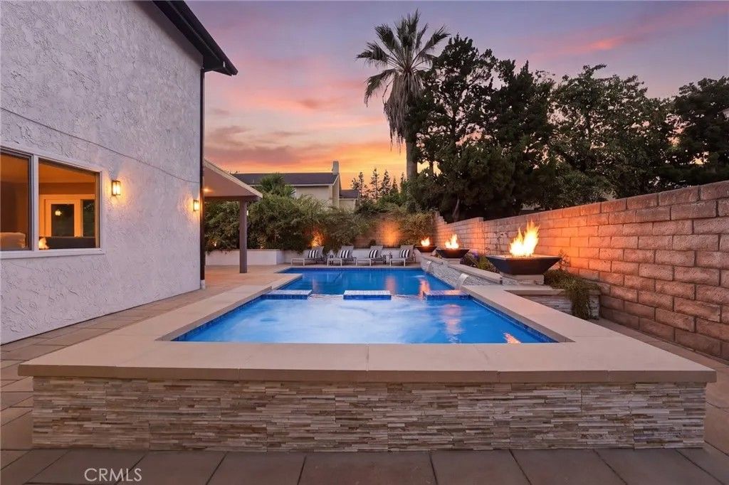 Photo of 7505 Bobbyboyar Avenue, West Hills, CA 91304 (MLS # SR26074561)