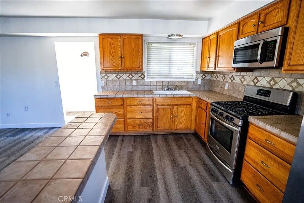 Photo of 21301 E Greenhaven St, Covina, CA 91724 (MLS # DW25267201)