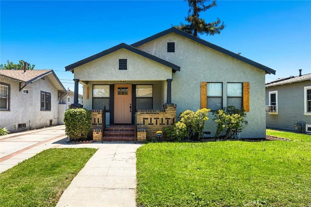 Photo of 1132 W 56th St, Los Angeles, CA 90037 (MLS # DW26175832)