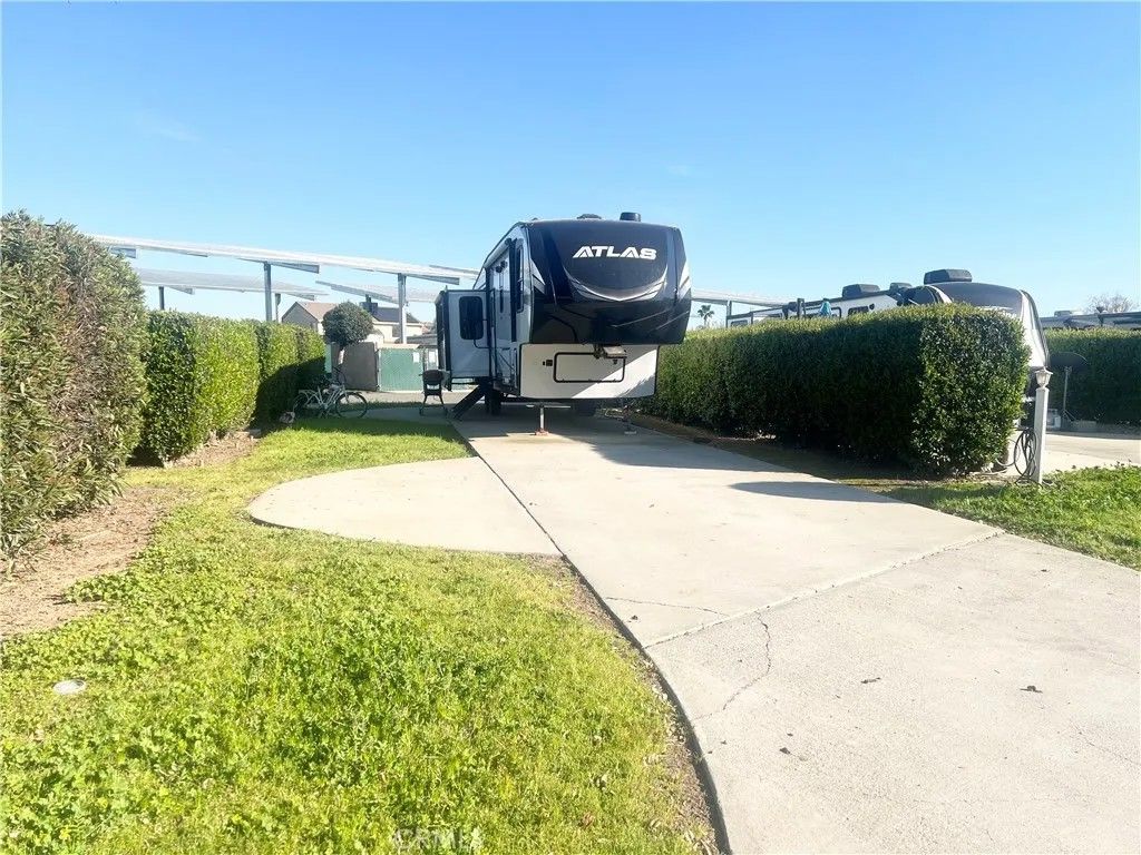 Photo of 5001 E. Robertson Blvd #49 Blvd, Chowchilla, CA 93610 (MLS # MC26045962)