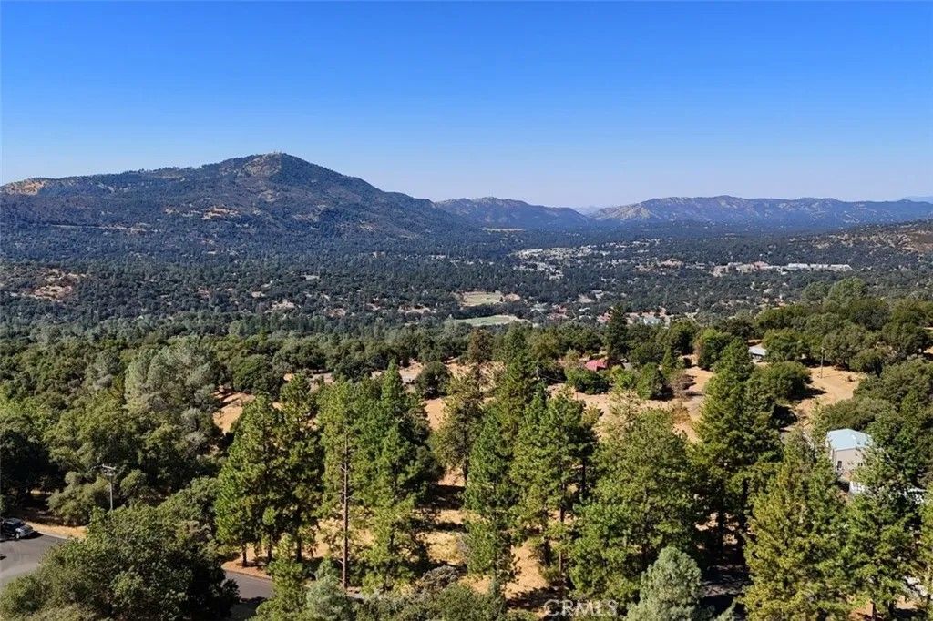 Photo of 10 Timberwood, Oakhurst, CA 93644 (MLS # FR26009012)