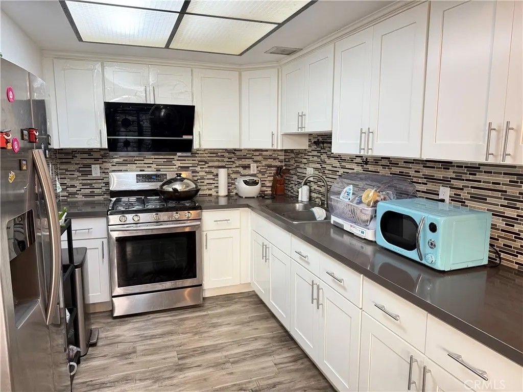 Photo of 527 S Orange Ave, Monterey Park, CA 91755 (MLS # WS25282224)