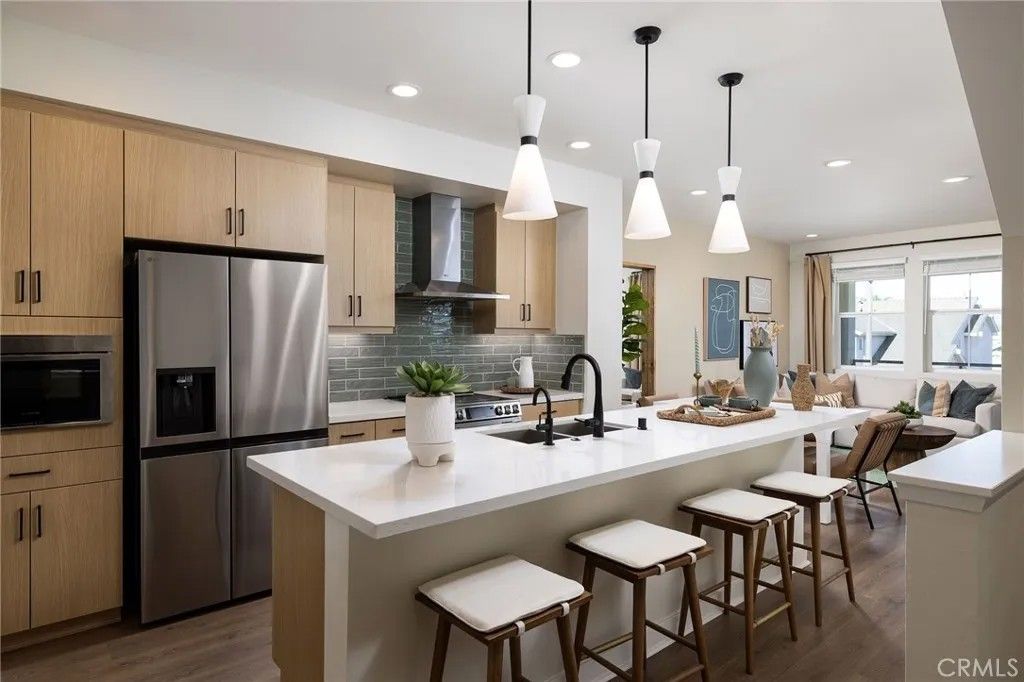 Photo of 144 S Iris, Compton, CA 90220 (MLS # OC26008323)