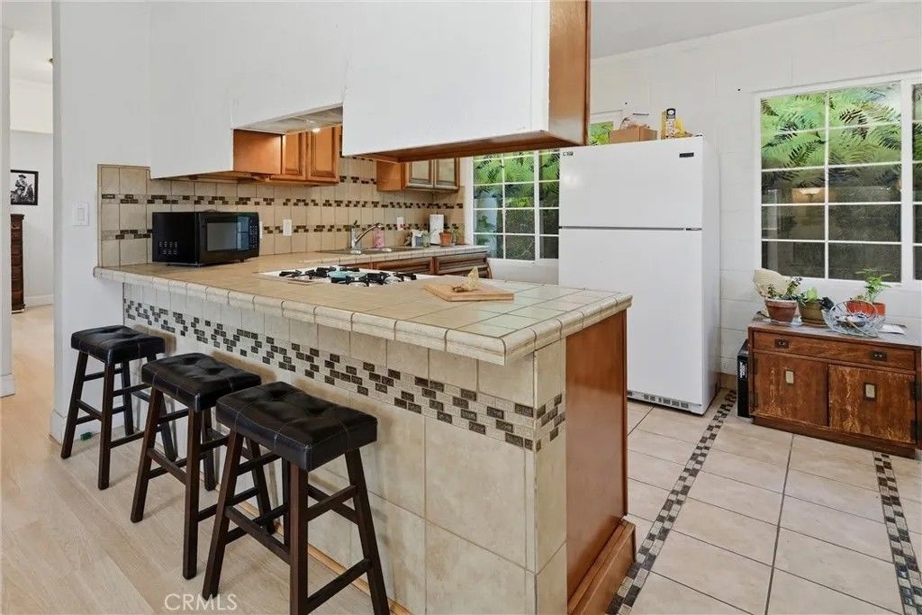 Photo of 11849 Widgeon Way, Clearlake Oaks, CA 95423 (MLS # LC26044106)