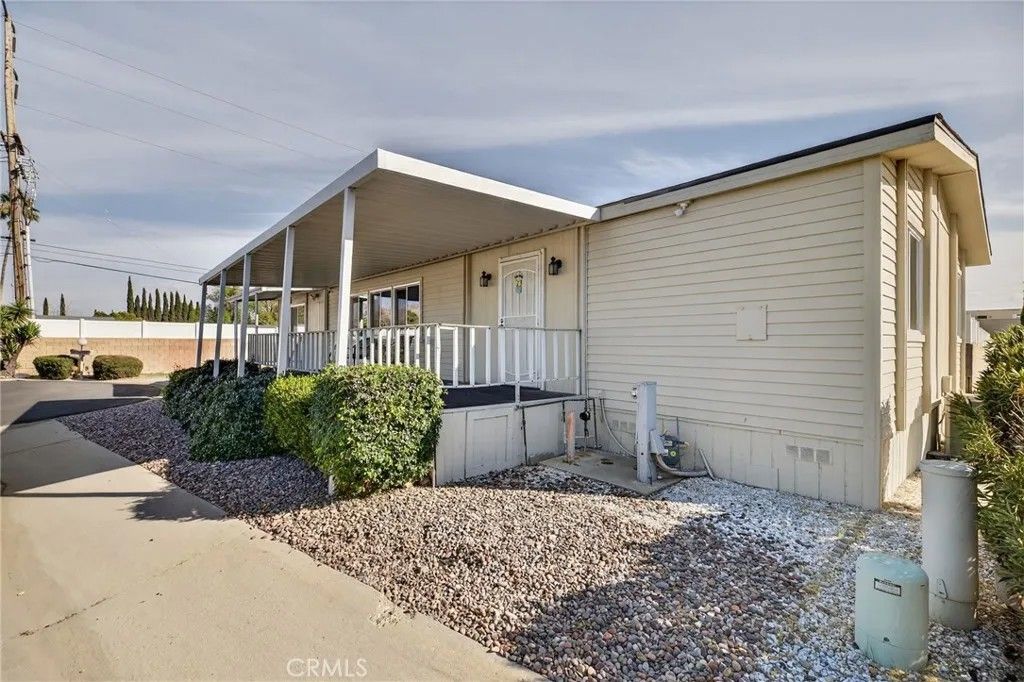 Photo of 23820 Ironwood Ave #153, Moreno Valley, CA 92557 (MLS # IV26041823)