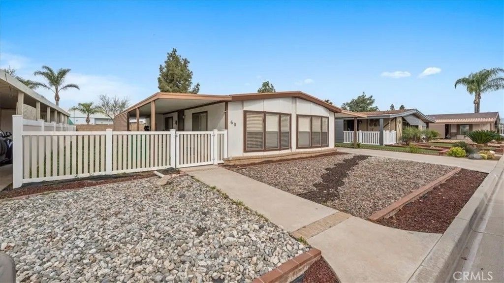 Photo of 13381 Magnolia Ave #60, Corona, CA 92879 (MLS # CV26015512)